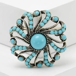 Vintage bohemian flower brooch with turquoise stone and antique silver finish for women
