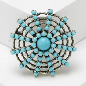 Vintage Turkish style brooch with sunburst web design and sky blue turquoise beads