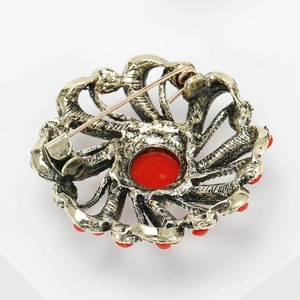 Retro Turkish style brooch with red crystals and vintage gold metal back view