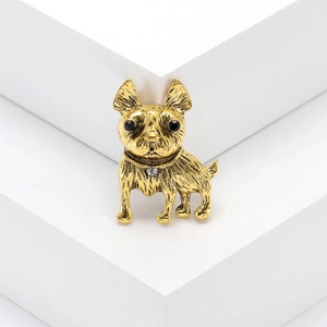 Vintage gold bulldog brooch with detailed texture and sparkling crystal collar