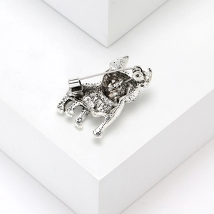 Detailed back view of vintage bulldog brooch showing silver alloy finish and pin clasp