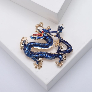 Elegant dragon brooch with navy enamel and golden metallic finish for men's suit