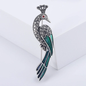 Broche paon élégante avec émail bleu-vert et strass étincelants pour accessoires
