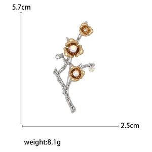 Elegant plum blossom branch brooch with gold and silver plating and sparkling rhinestones