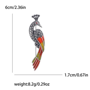 Élégante broche paon en métal argenté avec plumes en émail coloré et cristaux gris