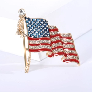 Sparkling American flag brooch with enamel and crystals on a golden flagpole