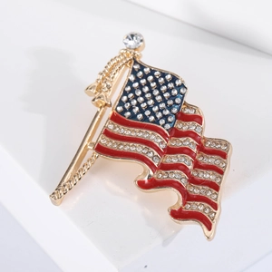 American flag brooch pin with red blue enamel and sparkling rhinestones in gold tone finish