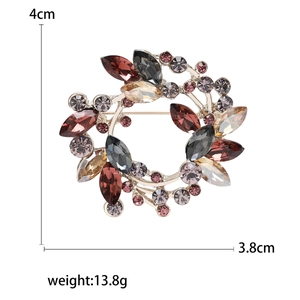 Broche couronne d'olivier en cristal avec strass colorés et mesures de taille précises