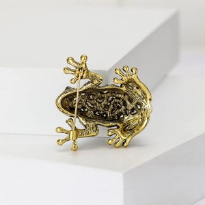 Vintage goldene Froschbrosche mit funkelnden Strasssteinen und strukturierter Oberfläche