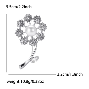 Sparkling rhinestone dandelion brooch with pearl center and precise dimensions shown