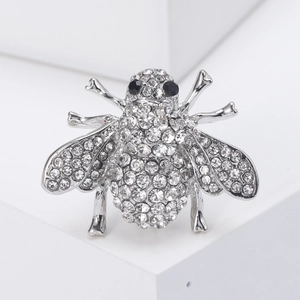 Sparkling rhinestone bee brooch in silver-tone alloy with crystal accents and black gem eyes
