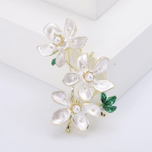 Elegant peach blossom flower brooch with white enamel petals and pearl center accents