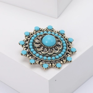 Vintage Turkish style hollow brooch with blue turquoise stone and sunburst bronze finish
