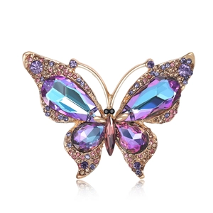 Eleganter Schmetterlings-Brosche in Gold mit lila und rosa Kristallen und Edelsteinen