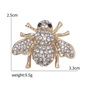 Creative bee brooch pin in gold alloy with clear rhinestones and black gem eyes