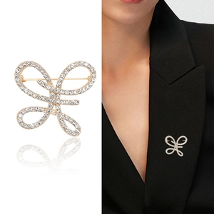 Broche nœud élégante en or avec strass scintillants pour accessoires de blazer