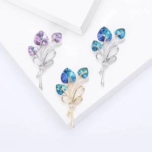 Exquisite crystal heart bouquet brooch with micro-pave zircons on a minimalist pedestal