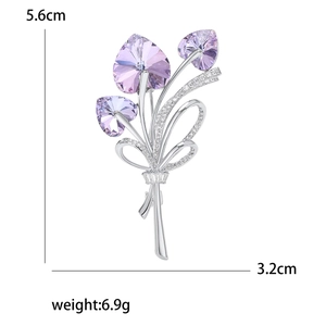Elegant crystal bouquet brooch with purple heart stones and sparkling micro-inlaid zircons