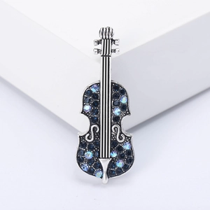 Elegant violin brooch with deep blue crystals and silver-toned alloy in minimalist style