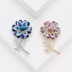 Elegant crystal flower brooch pins in blue and pink gradients with cubic zirconia accents