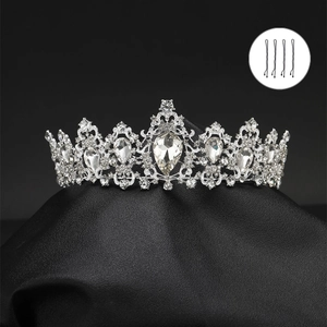 Detailed close-up of luxury bridal crown with clear crystals and included bobby pins
