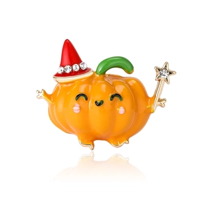 Cartoon Halloween pumpkin brooch in orange enamel with a red wizard hat and crystal stars