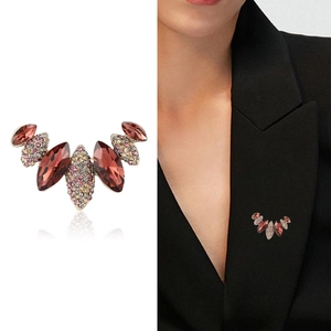 Elegant gold fan-shaped brooch with dark red crystals and rhinestones for coats