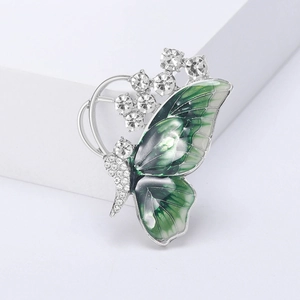 Elegant butterfly brooch pin with green enamel gradient and sparkling crystals in silver finish