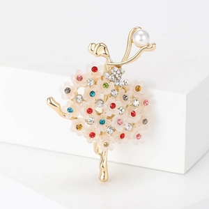 Details der eleganten Ballerina-Brosche mit bunten Strasssteinen und Goldmetall
