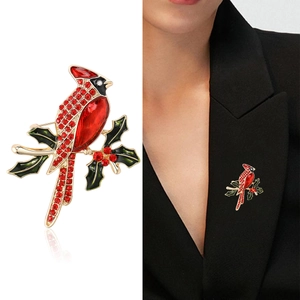 Broche oiseau cardinal étincelante avec strass rouges et détails de feuilles d'émail