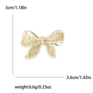 Elegant gold bow brooch with white pearls, 3.6cm x 3cm size, weighing 6.6g