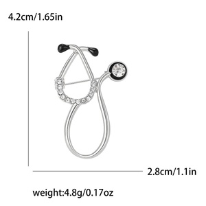 Silver stethoscope brooch with rhinestones and black enamel accents for medical gift