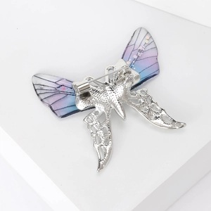 Elegant rhinestone butterfly brooch pin with purple gradient wings and silver metal base