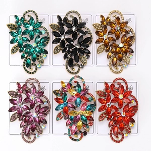 Detailed grid view showing vintage floral crystal brooches in six elegant colors