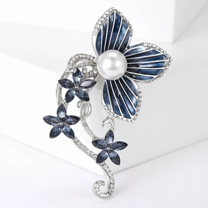Elegant camellia flower brooch with blue enamel petals, imitation pearl and sparkling crystals