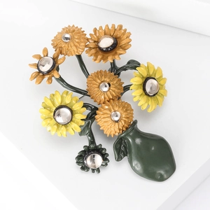 Exquisite Van Gogh sunflower brooch in a green vase with vibrant yellow enamel finish