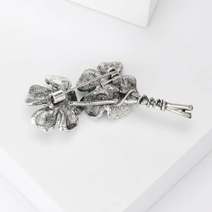 Elegant floral flower brooch with antique silver finish and detailed back pin mechanism