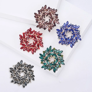 Elegant hollow floral brooch set with crystal rhinestones in five vibrant colors