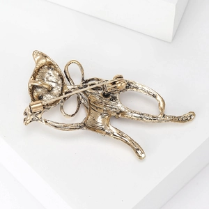 Detailed back view of vintage gold cat brooch showing the secure alloy safety pin mechanism