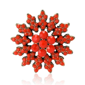 Baroque snowflake brooch with red crystals and vintage gold metal base for women