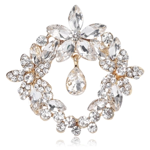 Elegant crystal wreath brooch with water drop pendant in gold setting and rhinestones