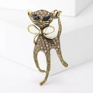 Elegant gold cat brooch with champagne crystals for blazers and casual sweaters