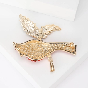 Prachtige gouden emaille vogelbroche met rode strass en veilige roterende speldsluiting