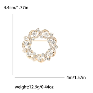 Broche couronne dorée élégante avec strass brillants et texture tressée pour femme