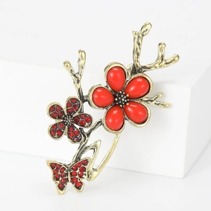Elegant vintage butterfly and plum blossom brooch with red rhinestones and gold finish