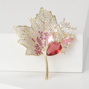 Exquisite maple leaf brooch with pink and white zircon stones on gold base plating