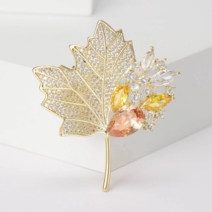 Elegant maple leaf brooch with gold base and sparkling zircon inlay for autumn fashion