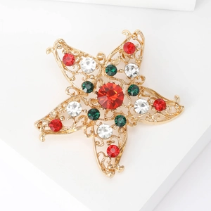 Vintage-Hohlstern-Brosche mit Goldbeschichtung und bunten funkelnden Strasssteinen
