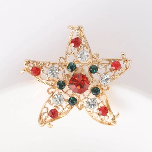 Hohlstern-Brosche aus Goldlegierung mit roten, grünen und klaren Kristallen