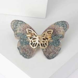 Broche papillon en tissu élégant avec placage à l'or et ailes dégradées bleu et violet